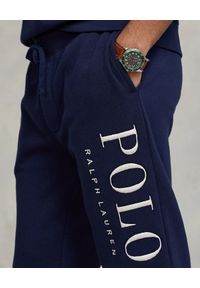 Ralph Lauren - RALPH LAUREN - Granatowe spodnie dresowe Jogger. Kolor: niebieski. Materiał: dresówka. Wzór: napisy, haft