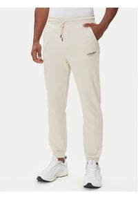 Jack & Jones - Jack&Jones Spodnie dresowe Kane Soho 12278943 Beżowy Regular Fit. Kolor: beżowy. Materiał: bawełna