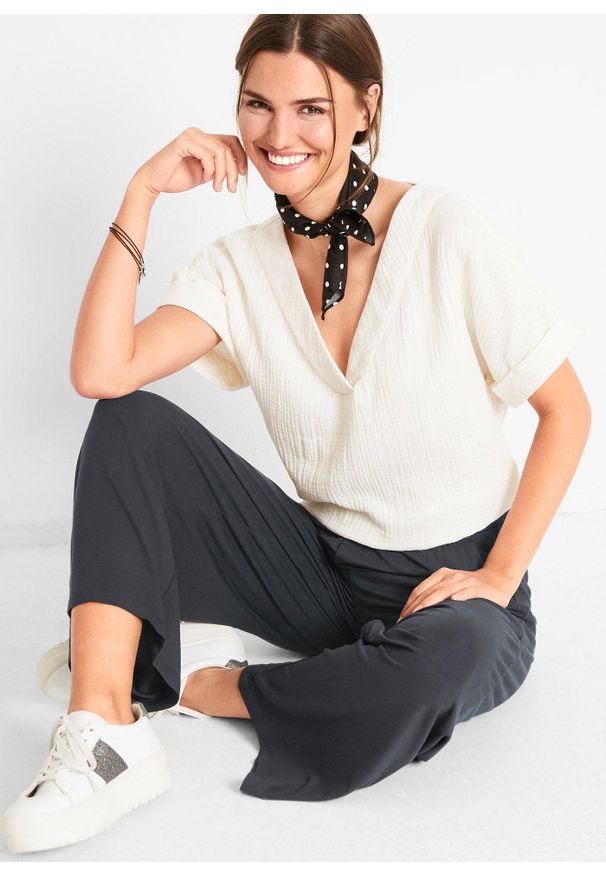 bonprix - Spodnie z dżerseju 7/8, z lejącej mieszanki wiskozy. Kolor: czarny. Materiał: jersey, wiskoza