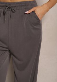 Renee - Ciemnoszare Szerokie Spodnie z Gumką w Talii i Kieszeniami Tosvelia. Okazja: na co dzień. Kolor: szary. Styl: elegancki, casual