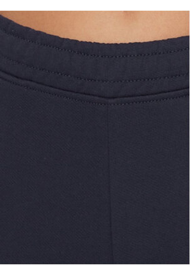 Tommy Jeans Spodnie dresowe DW0DW16379 Granatowy Relaxed Fit. Kolor: niebieski. Materiał: bawełna