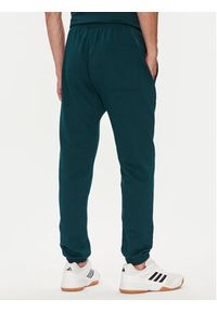 Adidas - adidas Spodnie dresowe ALL SZN Fleece JX5096 Zielony Tapered Leg. Kolor: zielony. Materiał: bawełna
