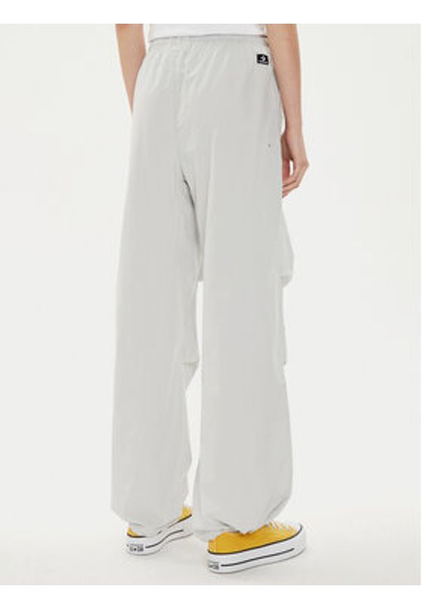 Converse Spodnie materiałowe W Parachute Pant 10026399-A02 Biały Loose Fit. Kolor: biały. Materiał: bawełna