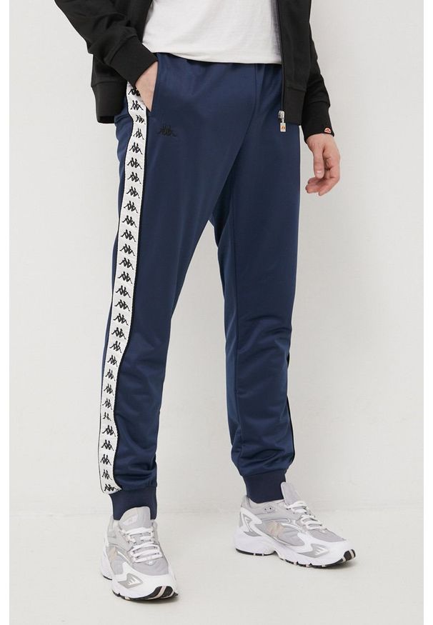 Kappa spodnie męskie kolor granatowy z aplikacją. Kolor: niebieski. Materiał: tkanina. Wzór: aplikacja