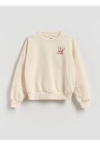 Reserved - Bluza z drobnym nadrukiem - złamana biel. Materiał: bawełna. Wzór: nadruk
