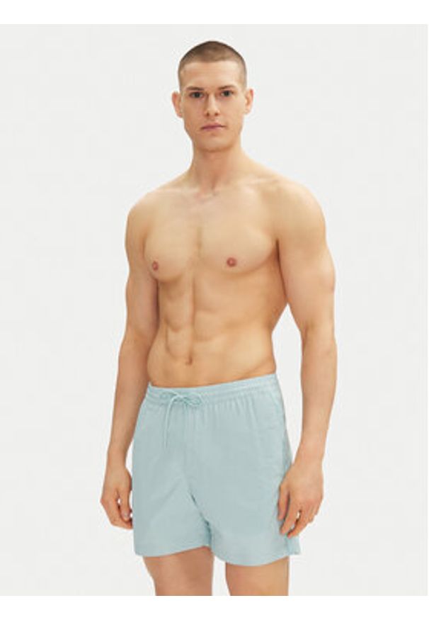 Calvin Klein Swimwear Szorty kąpielowe KM0KM01109 Niebieski Regular Fit. Kolor: niebieski. Materiał: syntetyk