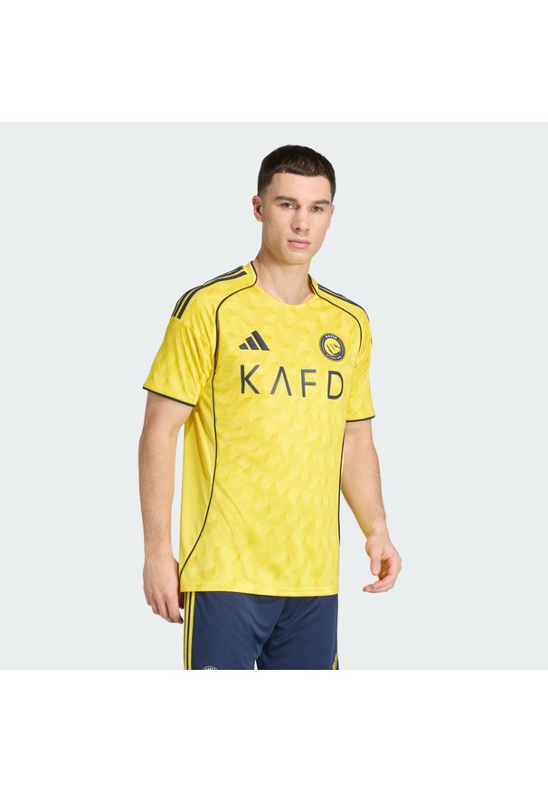 Adidas - Koszulka podstawowa Al Nassr FC 25/26. Kolor: żółty, niebieski, wielokolorowy. Sport: piłka nożna