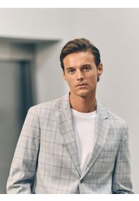 Reserved - T-shirt regular z interlokowym splotem - biały. Kolor: biały. Materiał: dzianina. Wzór: ze splotem #1