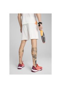 Puma - Męskie szorty treningowe do padla INDIVIDUAL PUMA. Kolor: wielokolorowy, pomarańczowy, żółty, biały, niebieski