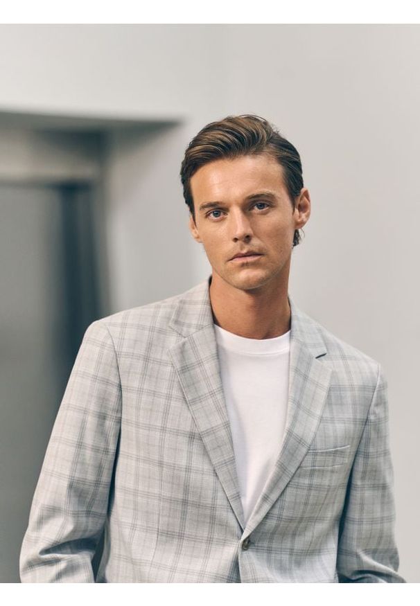 Reserved - T-shirt regular z interlokowym splotem - biały. Kolor: biały. Materiał: dzianina. Wzór: ze splotem