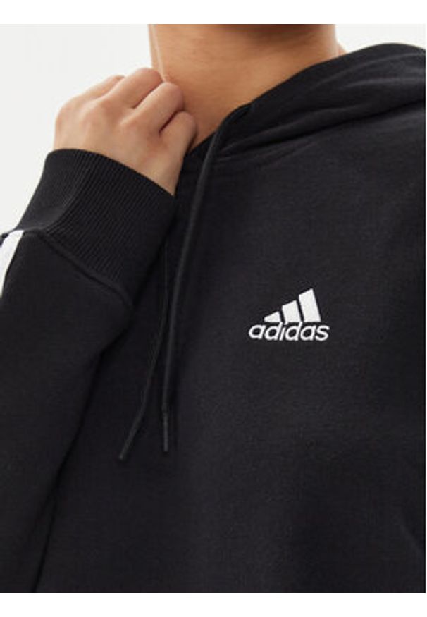 Adidas - adidas Bluza Essentials 3-Stripes French Terry Crop Hoodie IC8767 Czarny Regular Fit. Kolor: czarny. Materiał: bawełna