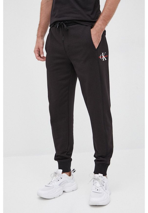 Calvin Klein Jeans spodnie bawełniane męskie kolor czarny gładkie. Kolor: czarny. Materiał: bawełna. Wzór: gładki