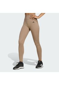 Adidas - Legginsy 7/8 bez szwu z przodu Optime Essentials. Kolor: brązowy. Technologia: ClimaCool (Adidas). Wzór: gładki