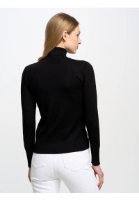 Big-Star - Sweter damski z golfem czarny Charlinka 906. Okazja: na spotkanie biznesowe, na co dzień. Typ kołnierza: golf. Kolor: czarny. Materiał: skóra, dzianina. Wzór: aplikacja. Styl: klasyczny, casual, biznesowy