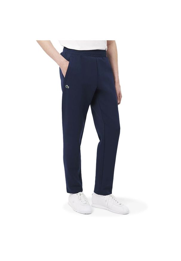 Spodnie męskie Lacoste XH9833-166 - granatowe. Kolor: niebieski. Materiał: bawełna, materiał, dresówka