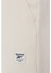 Reebok Classic Spodnie GR0413 damskie kolor kremowy gładkie. Kolor: beżowy. Materiał: dzianina. Wzór: gładki #3