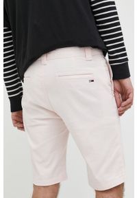 Tommy Jeans szorty męskie kolor różowy. Kolor: różowy. Materiał: tkanina, materiał. Wzór: gładki #2