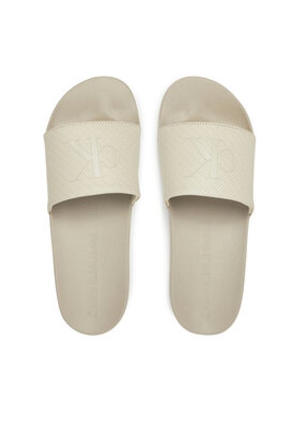 Calvin Klein Jeans Klapki Slide Aop Print YM0YM01269 Beżowy. Kolor: beżowy. Wzór: nadruk