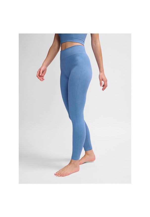 Damskie legginsy bezszwowe Hummel MT Adapt MW. Kolor: fioletowy. Sport: joga i pilates
