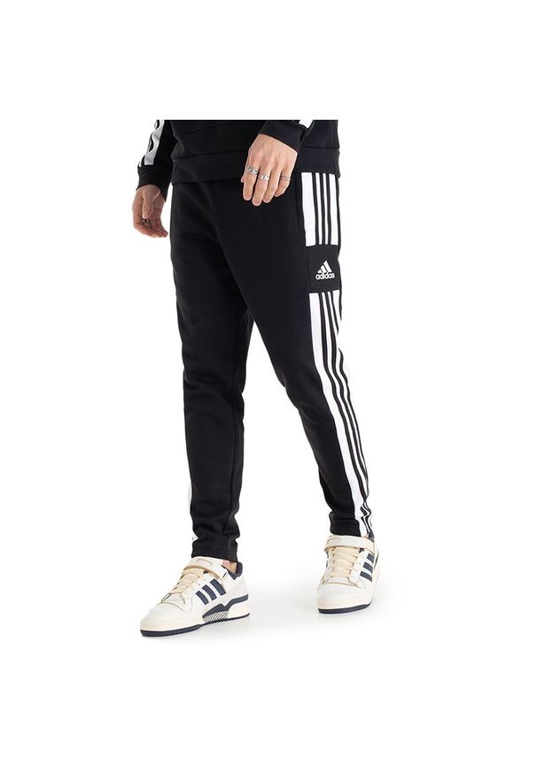 Adidas - Spodnie adidas Squadra 21 Sweat Pants GT6642 - czarne. Kolor: czarny. Materiał: bawełna, poliester, dresówka, materiał