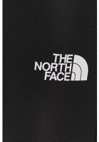 The North Face - Legginsy. Kolor: czarny. Materiał: dzianina. Wzór: gładki