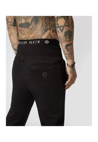 Philipp Plein - PHILIPP PLEIN Spodnie dresowe męskie ,,joggging trousers rock pp. Kolor: czarny. Materiał: dresówka. Wzór: napisy