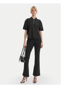 Calvin Klein Spodnie materiałowe LV044B223G Czarny Flare Fit. Kolor: czarny. Materiał: syntetyk #5