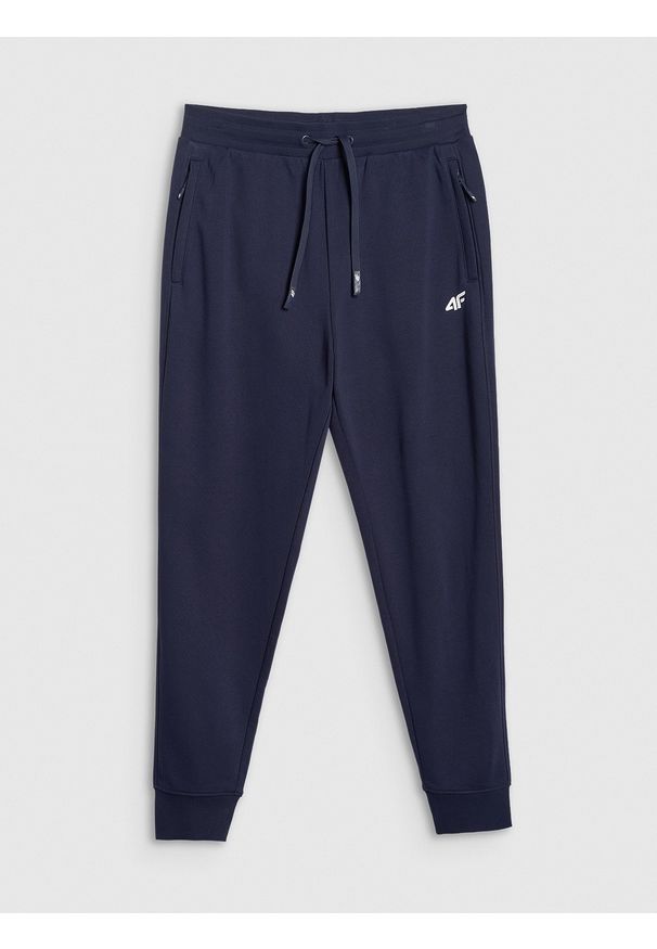 4f - 4F Spodnie dresowe joggery męskie - granatowe M. Kolor: niebieski. Materiał: dresówka. Sport: turystyka piesza, fitness