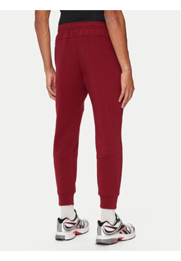 Under Armour Spodnie dresowe UA Unstoppable 1389353 Czerwony Regular Fit. Kolor: czerwony. Materiał: syntetyk