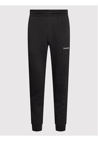 Calvin Klein Spodnie dresowe Micro Logo K10K109940 Czarny Relaxed Fit. Kolor: czarny. Materiał: dresówka, bawełna #3
