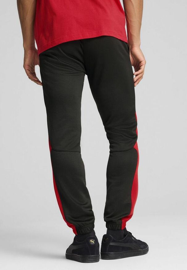 Puma - Męskie spodnie AC Milan ftblNRGY+ PUMA Black For All Time Red. Kolor: czerwony, czarny, wielokolorowy. Materiał: dresówka. Wzór: aplikacja
