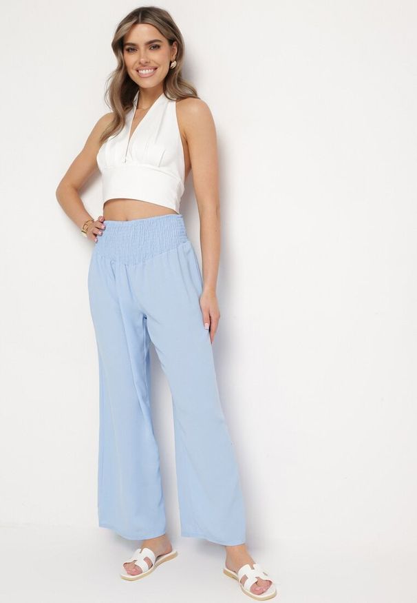 Born2be - Jasnoniebieskie Spodnie z Prostą Nogawką i Marszczoną Gumką w Pasie Perdila. Kolor: niebieski. Sezon: lato