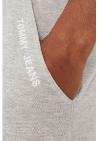 Tommy Jeans Spodnie męskie kolor szary melanżowe. Kolor: szary. Materiał: bawełna. Wzór: melanż #5