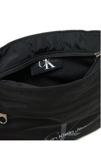 Calvin Klein Jeans Saszetka Sport Essentials Flatpack 18 LV04G3030G Czarny. Kolor: czarny. Materiał: materiał