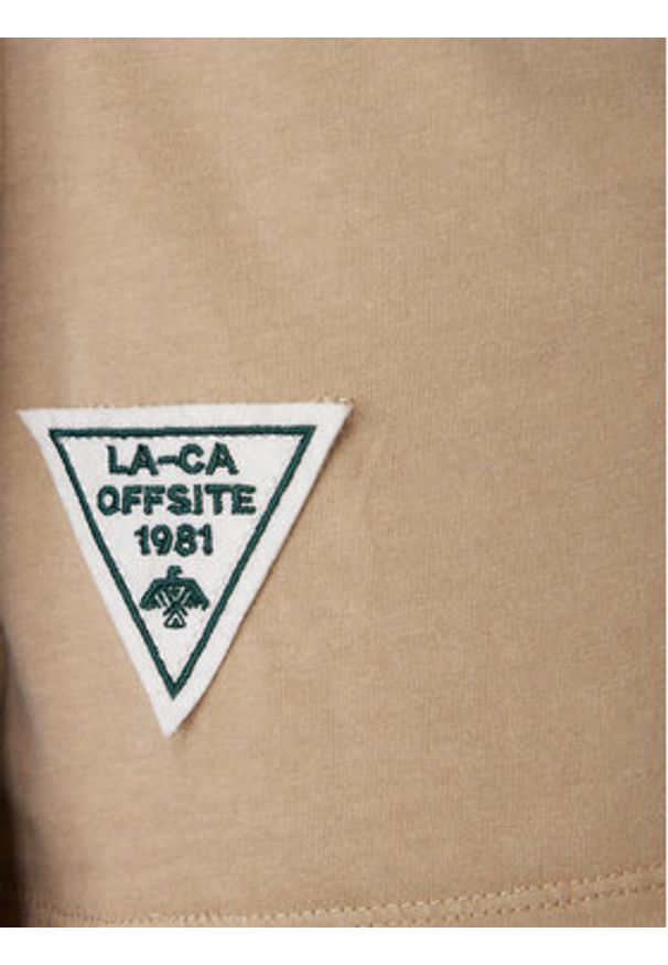 Guess T-Shirt M6RI07 KBW41 Beżowy Regular Fit. Kolor: beżowy. Materiał: bawełna