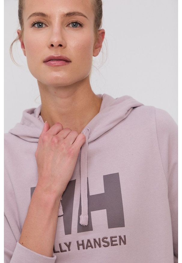 Helly Hansen - Bluza. Typ kołnierza: kaptur. Kolor: różowy. Długość rękawa: długi rękaw. Długość: długie