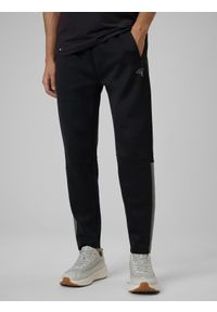 4f - 4F Spodnie treningowe szybkoschnące męskie - czarne XL. Kolor: czarny. Materiał: skóra. Sport: fitness #2
