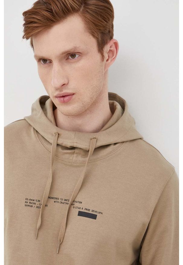 G-Star RAW - G-Star Raw bluza bawełniana męska kolor beżowy z kapturem z nadrukiem. Okazja: na co dzień. Typ kołnierza: kaptur. Kolor: beżowy. Materiał: bawełna. Wzór: nadruk. Styl: casual