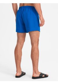 Ombre Clothing - Neonowe męskie szorty kąpielowe z efektem magic print – niebieskie V3 OM-SRBS-0147 - XXL. Kolor: niebieski. Materiał: poliester. Długość: krótkie. Wzór: nadruk. Styl: wakacyjny #2