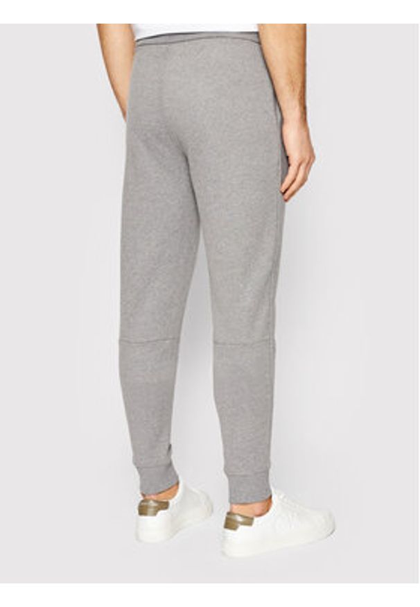 Calvin Klein Spodnie dresowe Small Logo K10K107954 Szary Regular Fit. Kolor: szary. Materiał: bawełna
