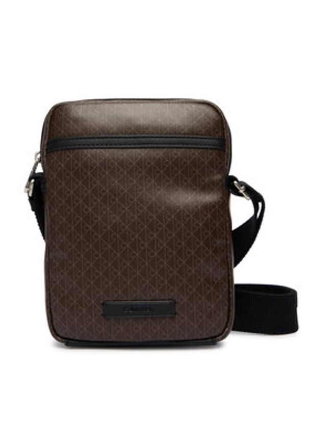 Calvin Klein Saszetka Emblem Aop Coated Slim Reporter LV04D3334G Brązowy. Kolor: brązowy. Materiał: skóra