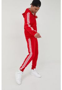 adidas Originals bluza Adicolor męska kolor czerwony z kapturem z aplikacją. Okazja: na co dzień. Typ kołnierza: kaptur. Kolor: czerwony. Materiał: materiał. Wzór: aplikacja. Styl: casual #3