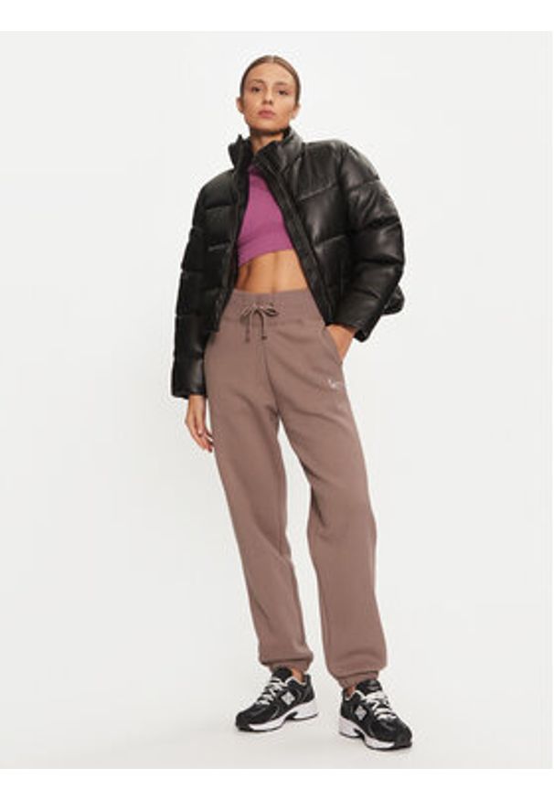 Karl Kani Spodnie dresowe Small Signature 61030014 Beżowy Relaxed Fit. Kolor: beżowy. Materiał: syntetyk