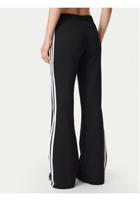 Adidas - adidas Spodnie dresowe 3S Flared KQ6424 Czarny Regular Fit. Kolor: czarny. Materiał: bawełna #2