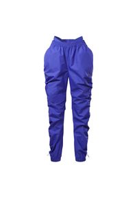 Damskie spodnie dresowe z tkaniny Reebok Cardi B. Kolor: fioletowy. Materiał: tkanina, dresówka. Sport: fitness