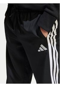 Adidas - adidas Spodnie dresowe Essentials Climacool JD6500 Czarny Regular Fit. Kolor: czarny. Materiał: syntetyk #5