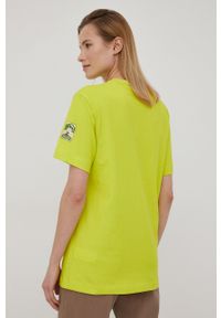 Puma t-shirt bawełniany PUMA x LIBERTY 534049 kolor zielony. Kolor: zielony. Materiał: bawełna. Długość rękawa: krótki rękaw. Długość: krótkie. Wzór: nadruk, aplikacja