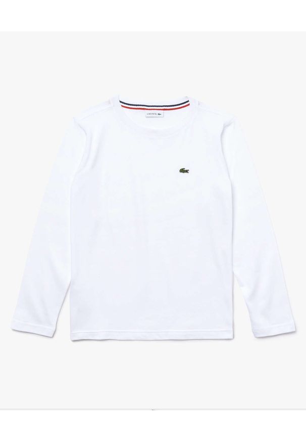 Lacoste - LACOSTE - Biała koszulka z długim rękawem. Kolor: biały. Materiał: bawełna, prążkowany. Długość rękawa: długi rękaw. Długość: długie. Wzór: aplikacja