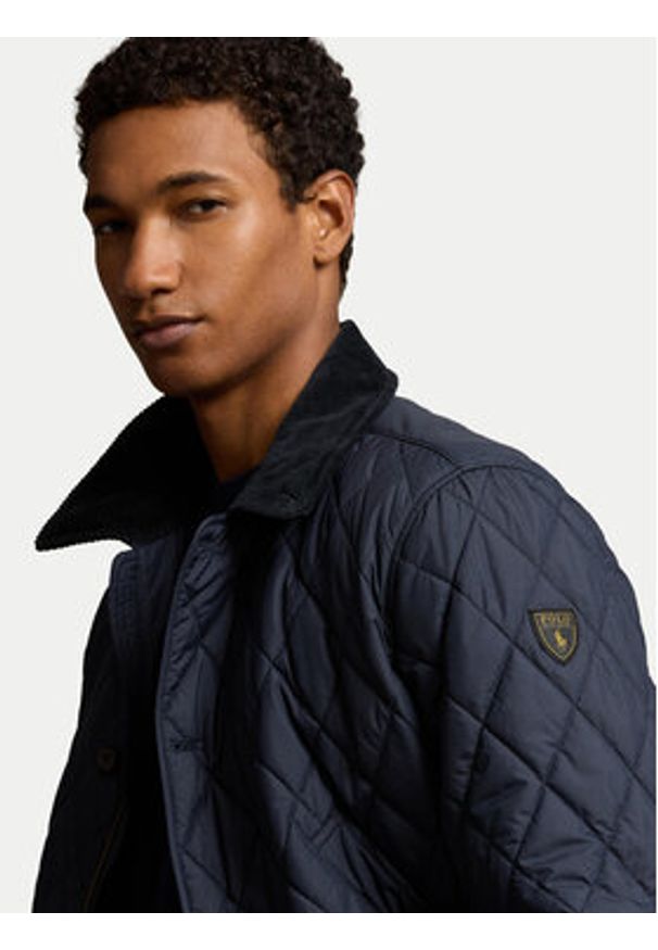 Polo Ralph Lauren Kurtka przejściowa 710938510001 Granatowy Regular Fit. Typ kołnierza: polo. Kolor: niebieski. Materiał: syntetyk