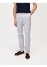 Reserved - Spodnie chino slim - lawendowy. Kolor: fioletowy. Materiał: bawełna, tkanina